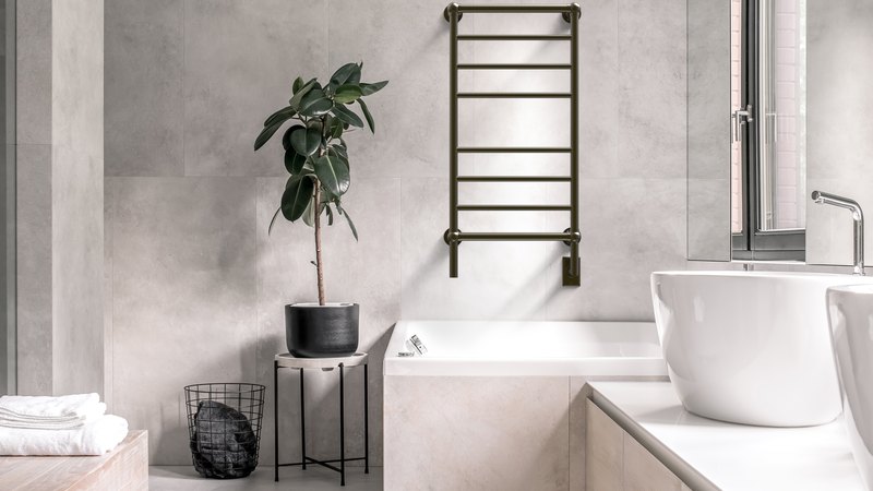 Amba heated towel rack in a primary bathroom